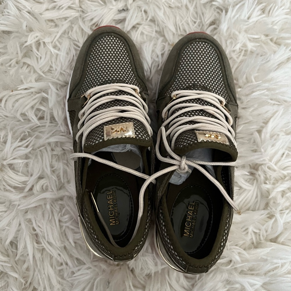 Michael kors high top sneakers.